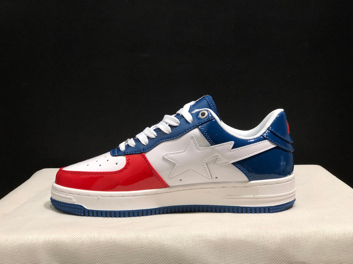 Side profile highlighting the white star-shaped side motif and blue outsole edge.