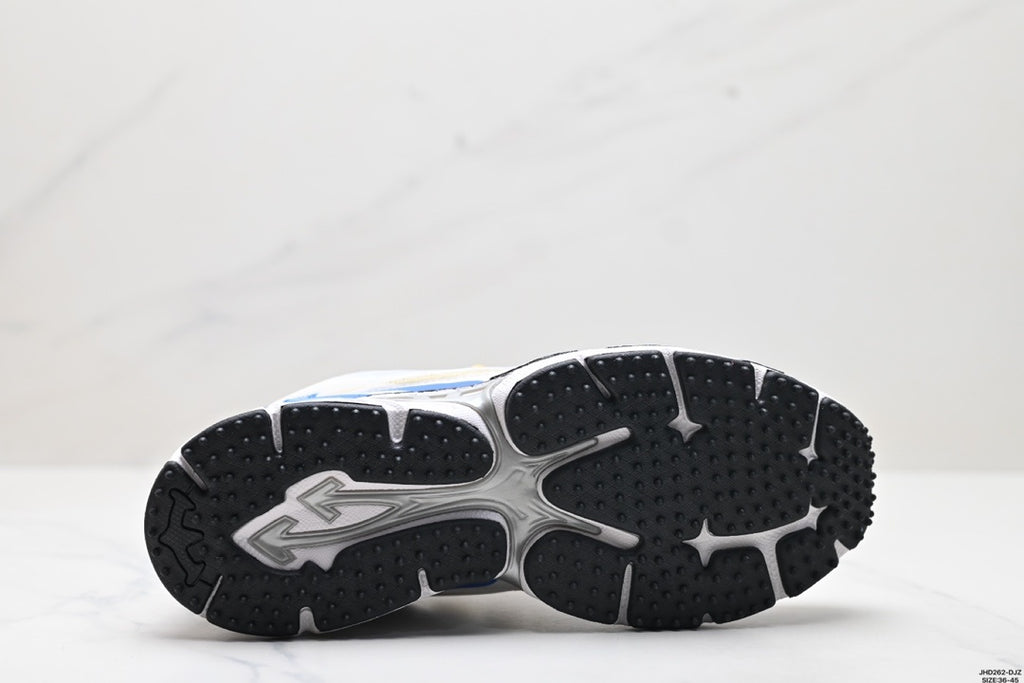 Outsole view showing the segmented black tread pattern and gray central sections.