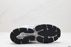 Outsole view showing the segmented black tread pattern and gray central sections.