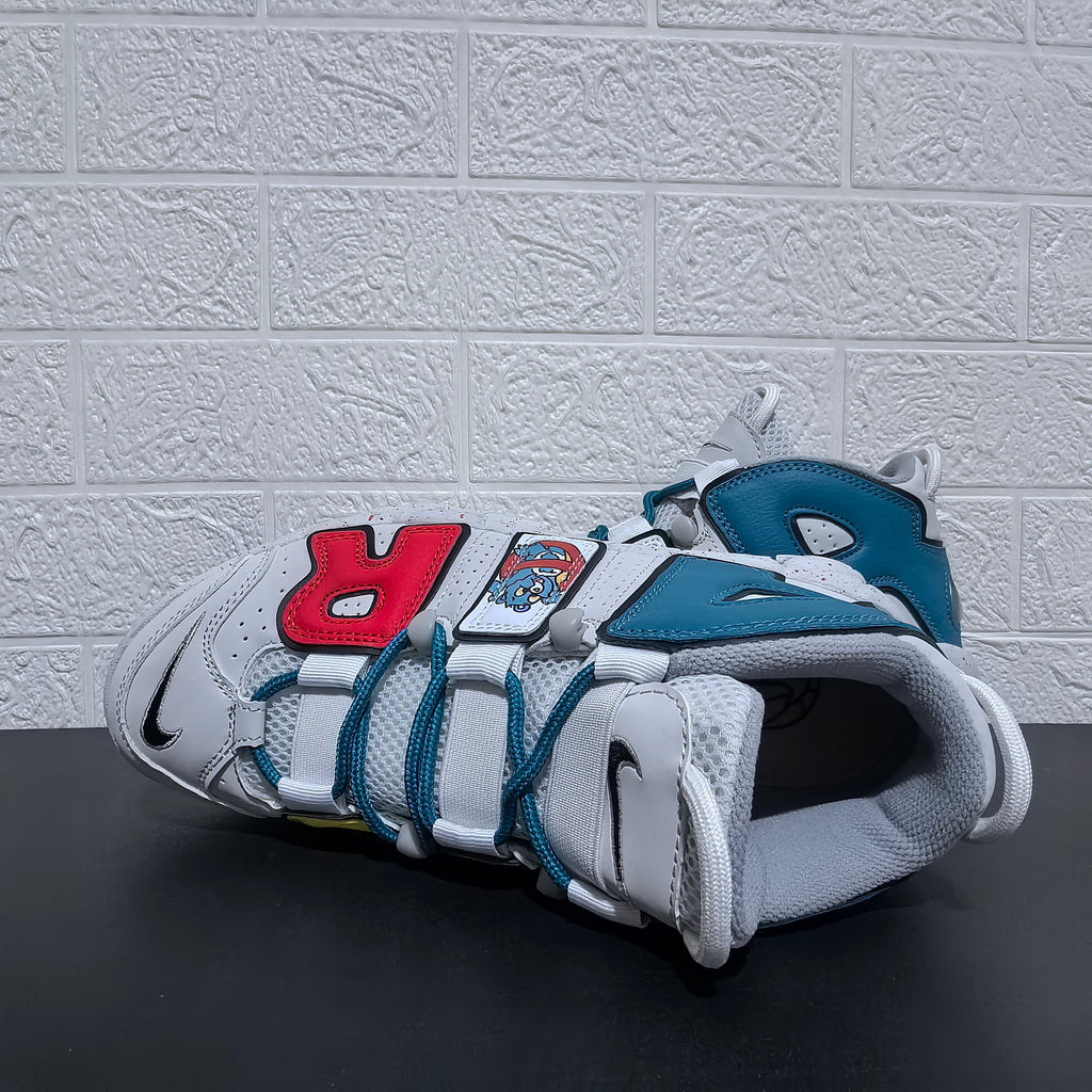 Top view showing teal laces, padded collar and bear graphic