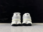 New Balance U9060JGR Sneakers in White and Grey