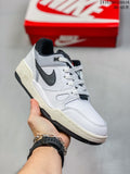 White and black Nike Full Force Low sneaker shown with a red Nike shoebox in the background; the image also displays style code 2410JDD320A16 and the size range 36–45.5.