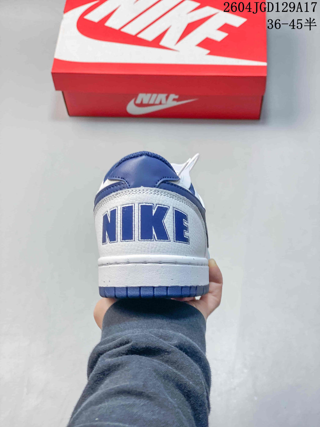 Rear view of the sneaker with blue heel accents