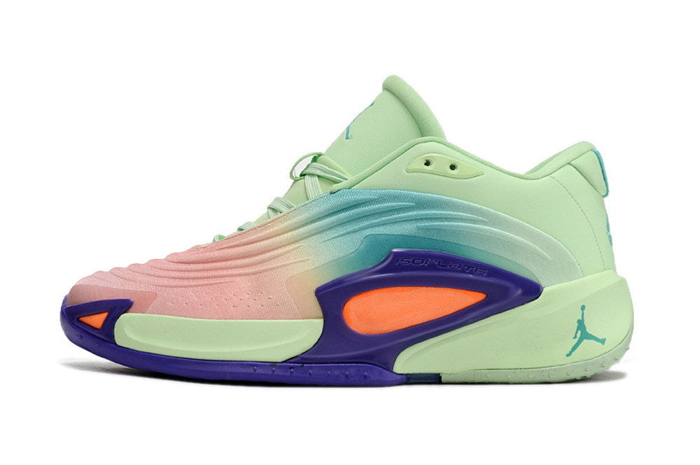 Side profile of a mint green Jordan Luka 3 shoe with a pink and blue gradient upper