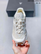Top view of the white sneaker showing the KAILAS tongue logo and multi-point quick-lacing system.
