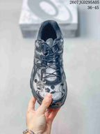 Top view showing the floral toe box, laces, tongue, and padded collar.