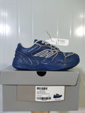 Navy and taupe Balenciaga 4090 sneaker displayed on its box, with the box label visible.
