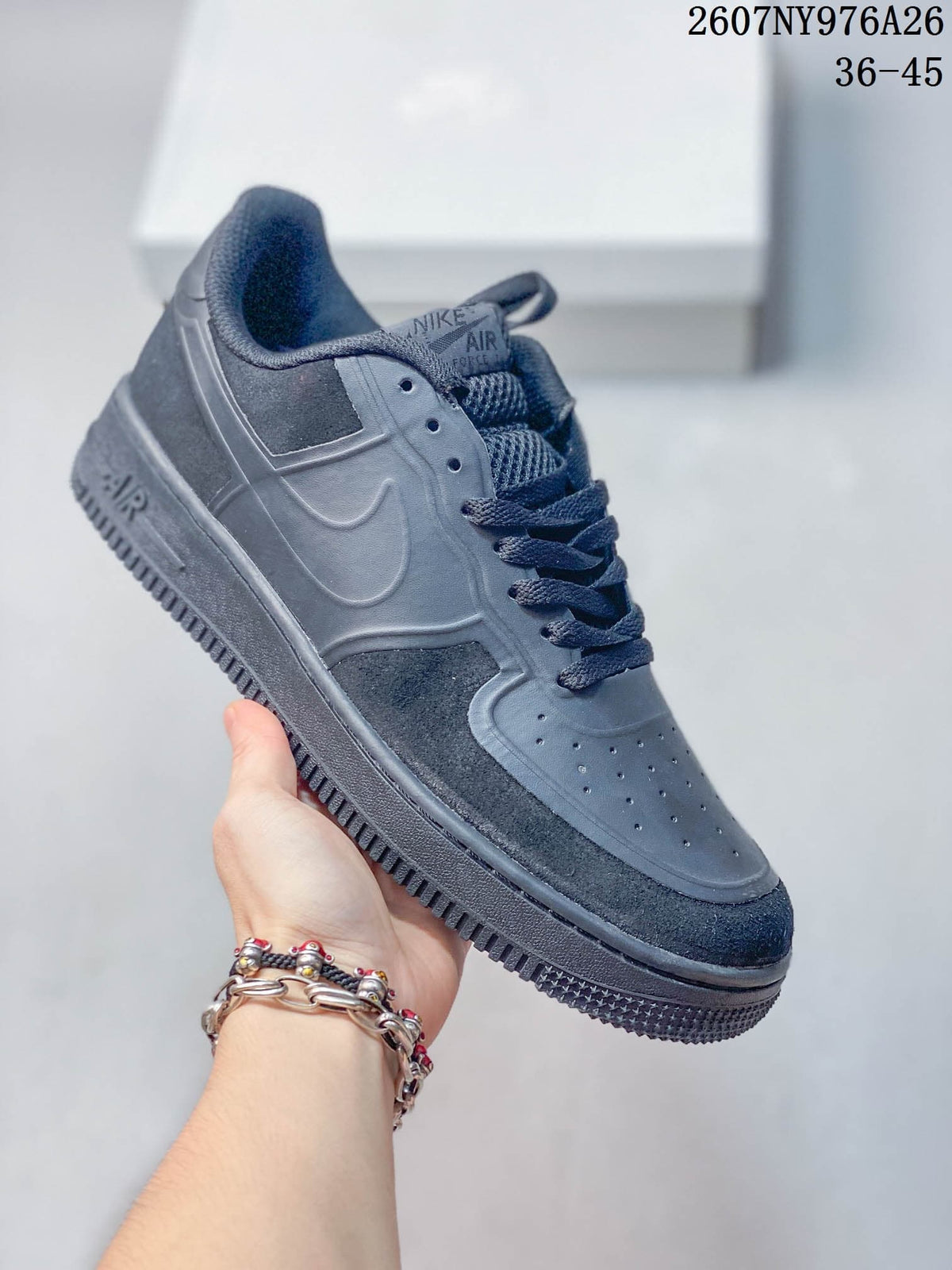 Dark gray Nike Air Force 1 '07 LV8 low-top sneaker with tonal side Swoosh and textured outsole.