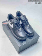 Pair of black and white Nike Air Force 1 '07 Low sneakers displayed on a shoe box; image text shows style code 2607JHD1198A18 and sizes 36–45.5.