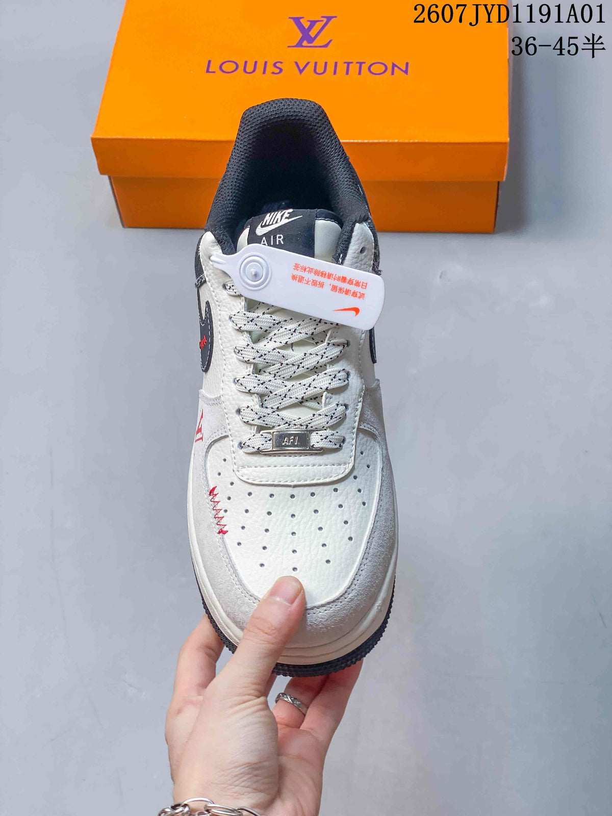 Front view highlighting perforated toe, patterned laces, and red accents