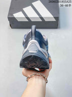 Rear view of the gray and blue trail running shoe showing the heel and outsole