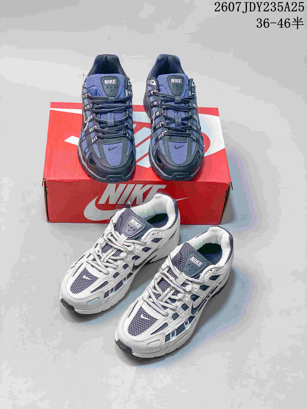 Both dark gray and white Nike P-6000 colorways shown together with a red shoebox.