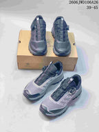 SREGIEK sneakers shown in dark navy and gray and light gray colorways.