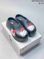 Four color options of adidas-style Hello Kitty platform mule clogs shown from the side.