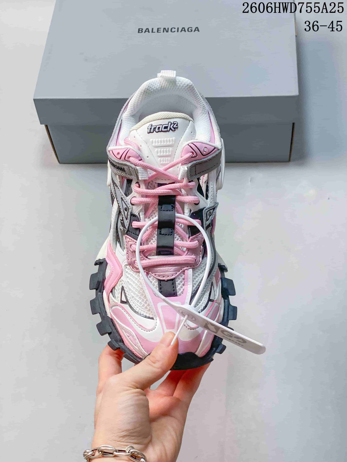 Top view of a Balenciaga Track 2 sneaker with pink laces and a visible tongue label; an image overlay shows a 36–45 size range.