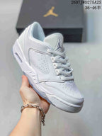 Angled close-up showing the white low-top construction, side panel and outsole details.