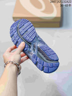 Close view of the shoe outsole showing segmented patterned tread.