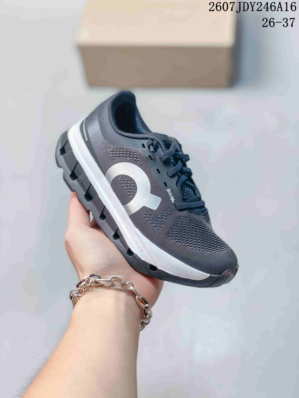 Dark gray On Cloudstratus 3 kids running shoe with a light side logo and white midsole.