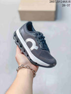 Dark gray On Cloudstratus 3 kids running shoe with a light side logo and white midsole.