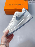 Side view of the off-white sneaker with gray Swoosh panel and patterned details