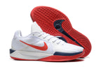 Nike Sabrina 1 shoe pair showing the red patterned outsole and side profile