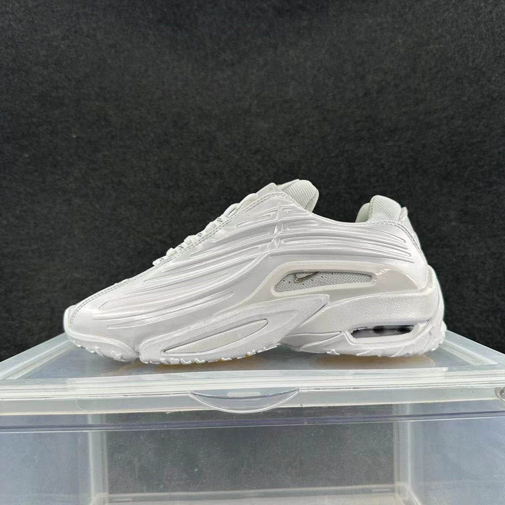 White low-top sneaker with raised linear side detailing