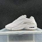 White low-top sneaker with raised linear side detailing