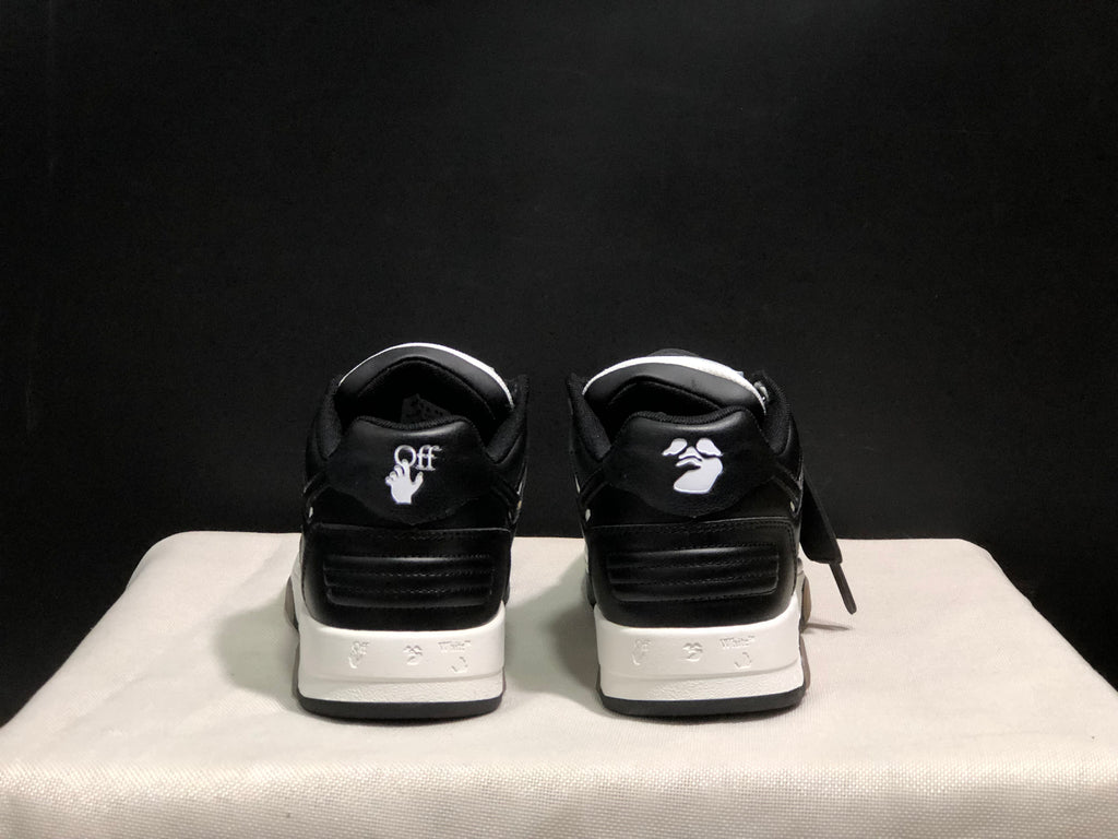 Rear view showing contrasting heel graphics, padded collars, and layered white midsoles.