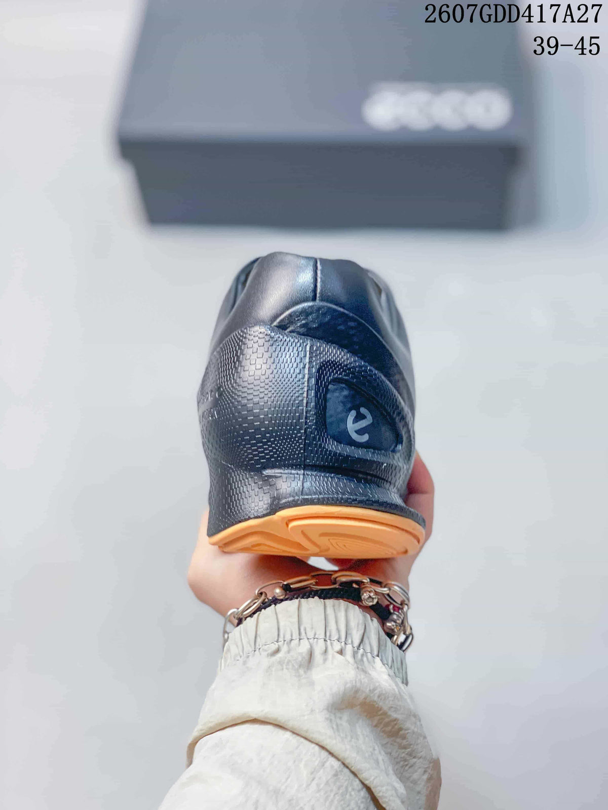 Rear view of the black sneaker showing the padded heel and ECCO logo detail.