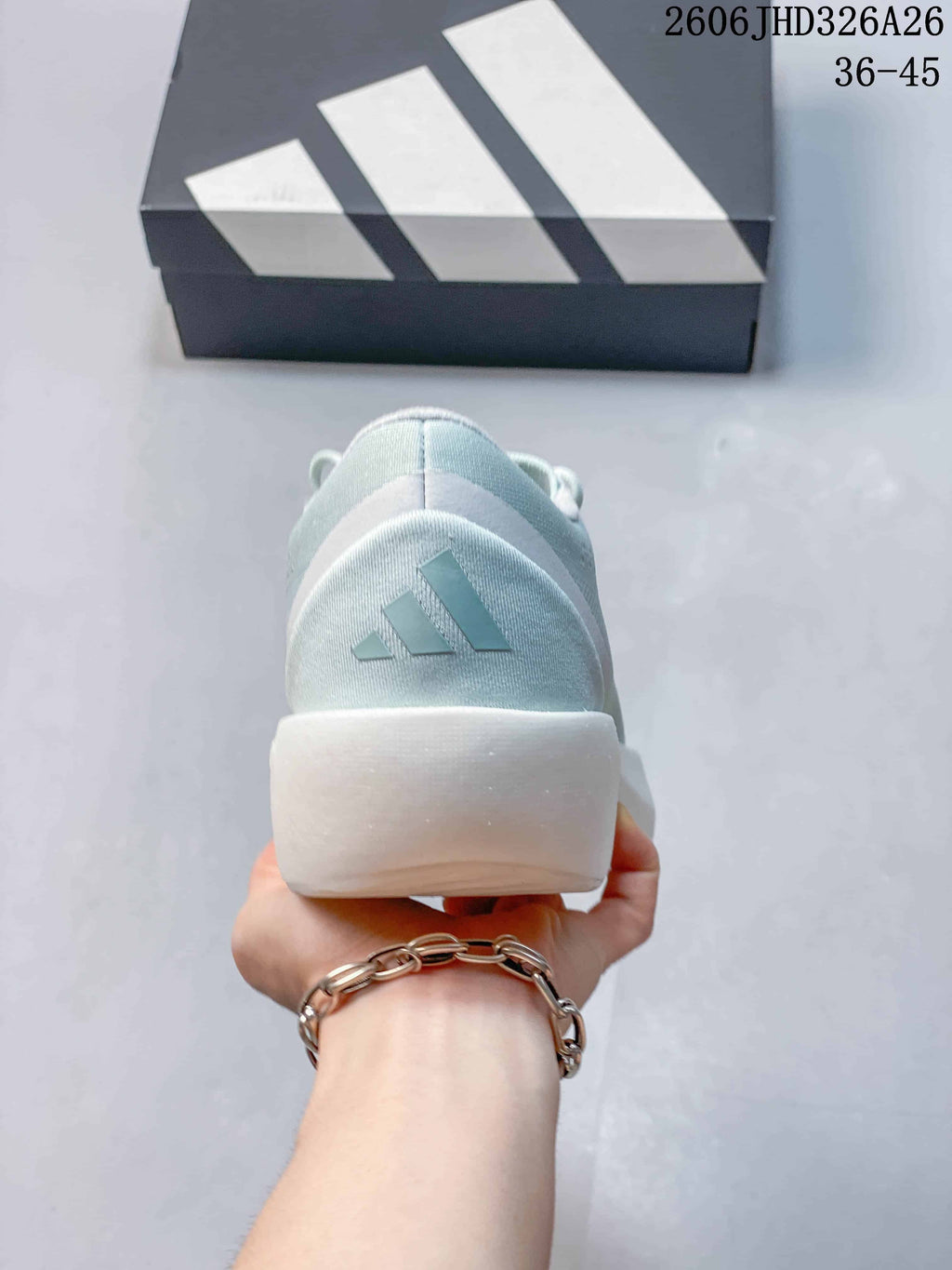 Rear view of a pale blue running shoe with three-stripe heel branding