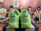 Rear view of lime green Jordan basketball shoes with teal heel details
