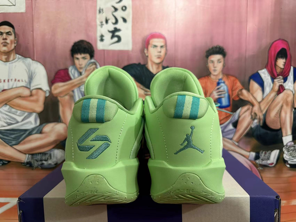 Rear view of lime green Jordan basketball shoes with teal heel details