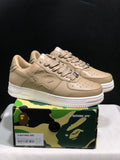 Pair of beige BAPE STA low-top sneakers displayed on a branded shoebox; the box label shows EU 43, US 9.5, UK 8.5 and CM 27.5.