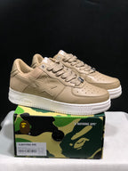 Pair of beige BAPE STA low-top sneakers displayed on a branded shoebox; the box label shows EU 43, US 9.5, UK 8.5 and CM 27.5.
