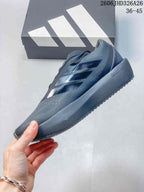 Side view of the charcoal adidas Supernova Rise 3 running shoe