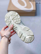 Underside view of the sneaker showing the segmented patterned outsole and tread design; overlay text shows style code 2607TGD295A05 and size range 36–45.