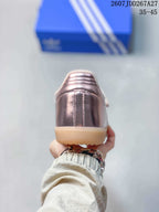 Rear view showing the metallic pink heel, stitched center panel and gum-colored outsole.