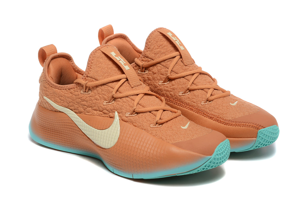 Pair of rust-brown Nike LeBron training shoes in a three-quarter view