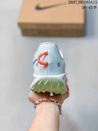 Rear view of a Nike Pegasus Trail 5 sneaker showing the padded heel collar, heel pull loop and textured outsole.