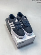 Pair of black adidas sneakers with white stripes displayed on an adidas shoebox; overlay text shows 2511LD293A24 and size range 36–45.