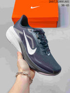Side view of a dark gray Nike Air Zoom Pegasus 42 running shoe with a white Swoosh.