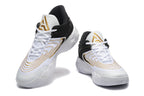 Front angled view of Nike Zoom Freak 5 basketball shoes with white laces and gold tongue logos