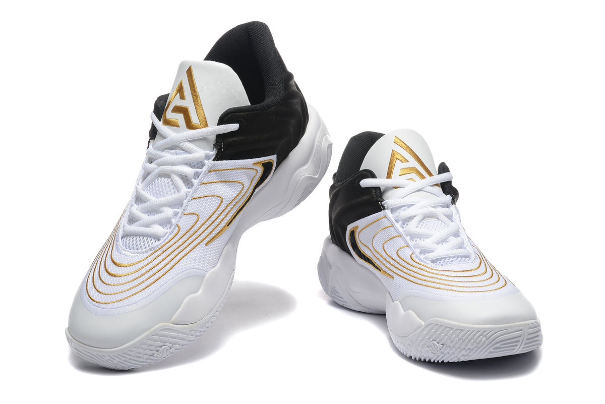 Front angled view of Nike Zoom Freak 5 basketball shoes with white laces and gold tongue logos