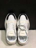 Top-down view showing the white laces, padded collars, textured panels, and branded tongues.