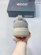 Rear view of a gray ECCO sneaker showing the padded heel, pull tab, stitching, and light-colored outsole.