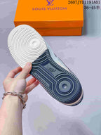 Underside of the sneaker showing a two-tone rubber outsole and circular traction patterns