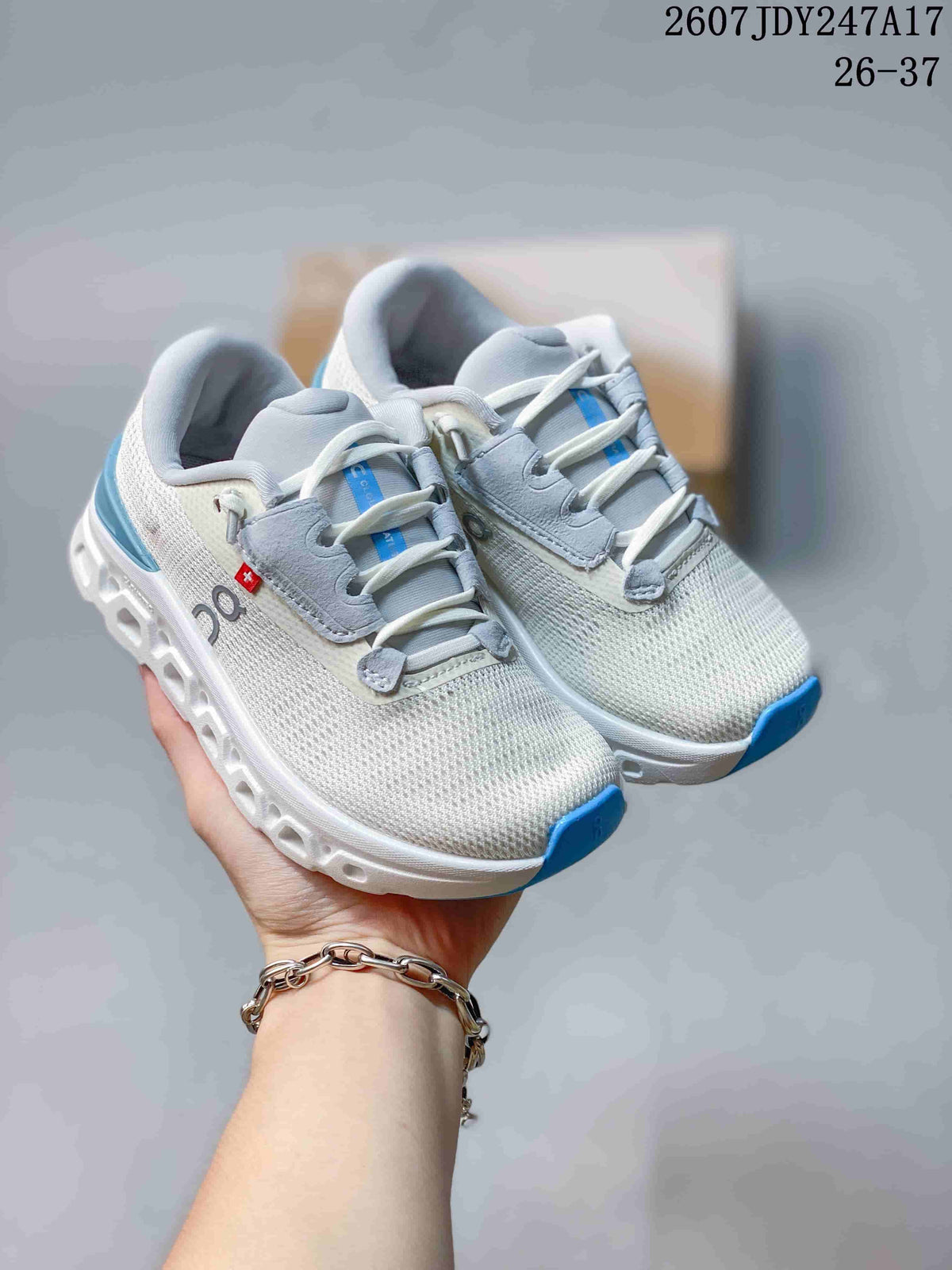 Pair of white and light gray On running shoes with blue accents, shown from an angled top view.