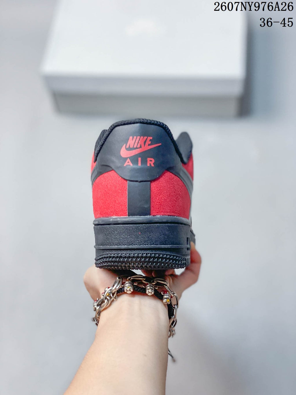 Rear view showing the black and red heel panels and padded collar.