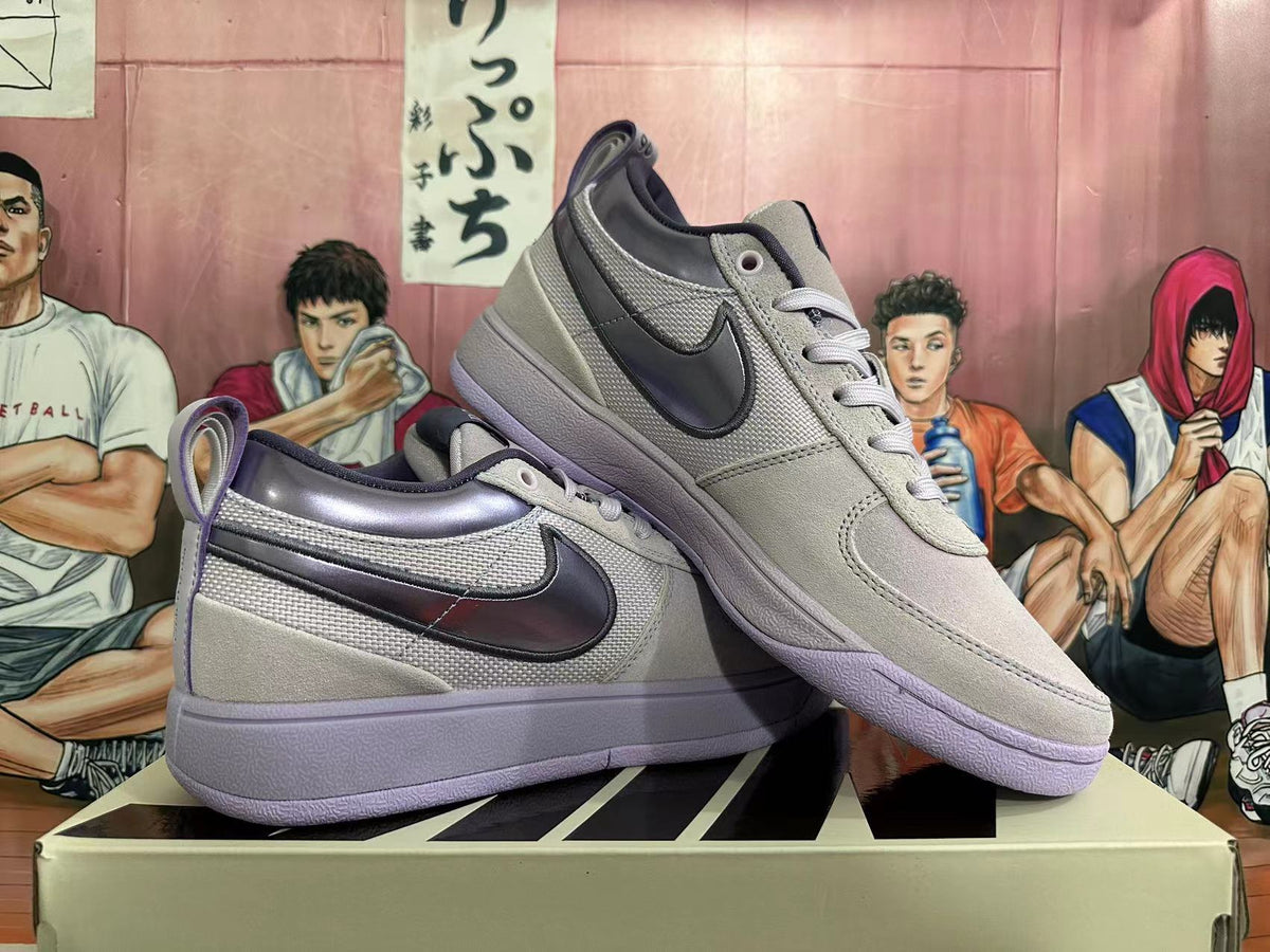 Pair of low-top sneakers in light gray-white with dark Swooshes and purple-toned soles, shown from the side.