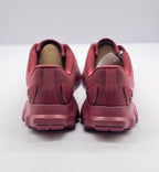 Rear view showing the padded collars, heel structure, outsole, and RUNNER heel detail.